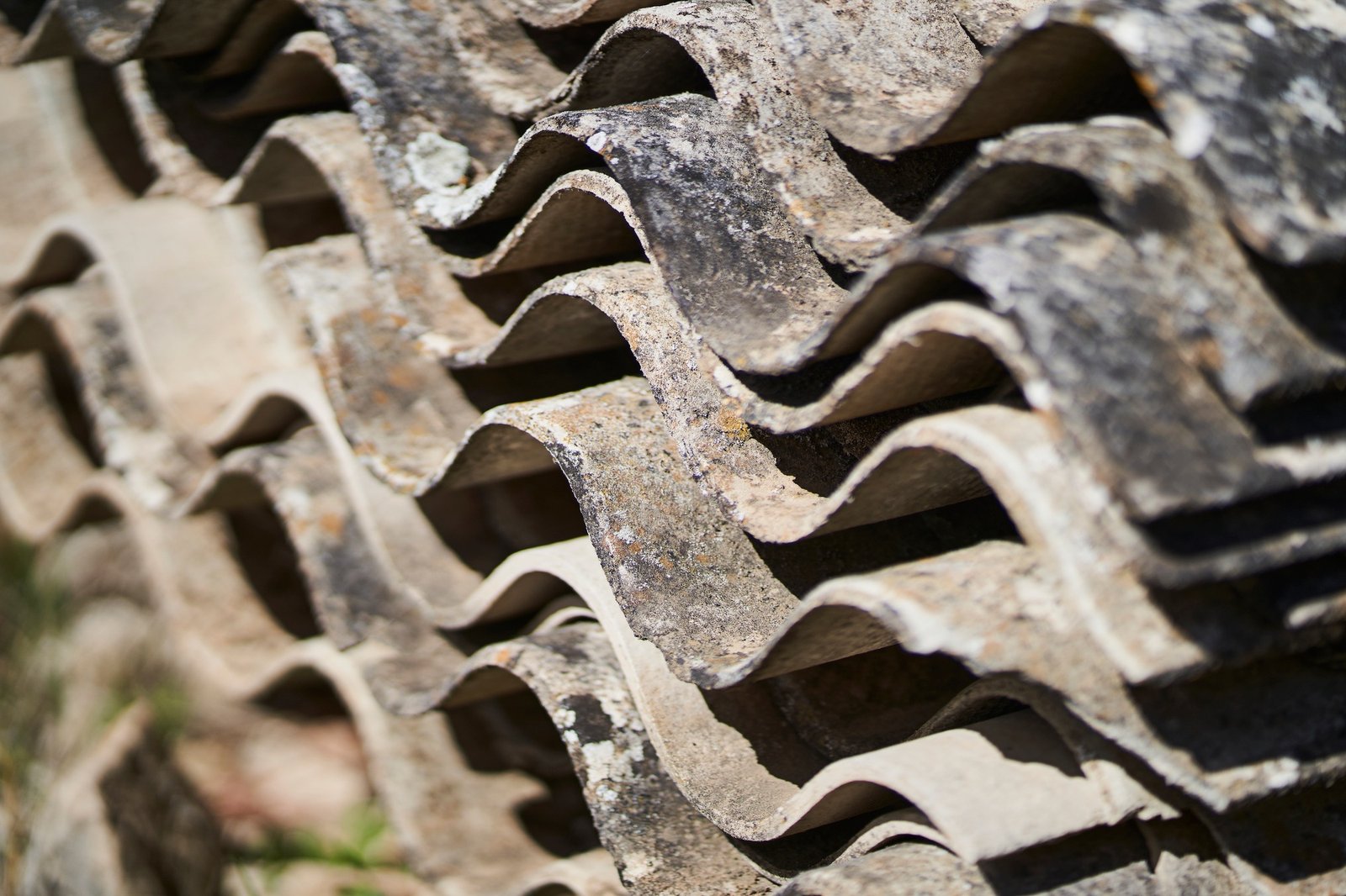toxic waste with asbestos from piled-up asbestos sheets